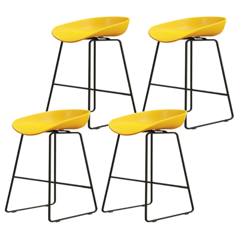 Modern Armless Backrest Counter Stool Iron Cafe Bar Stool with Pedal and Acrylic Seat Yellow 4 Piece Set Short Stool(18"H) Clearhalo 'Bar Furniture' 'Bar Stools' 'bar_stools' 'furn' 'furn_bar_stools' 'Furniture' 'furniture_bar_stools' 'Kitchen & Dining Furniture' 5061905
