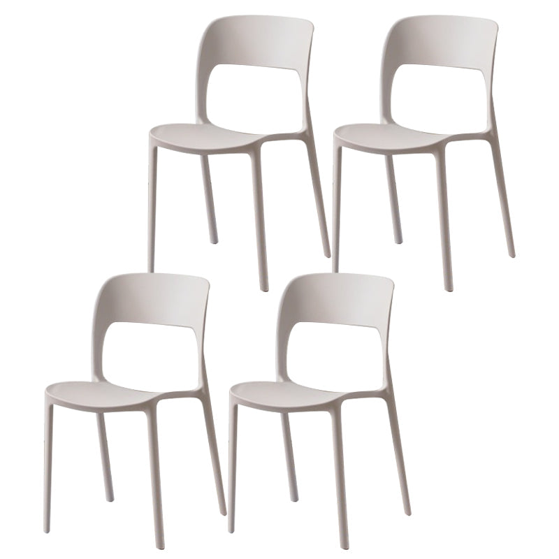 Glam Style Open Back Chair Plastic Stackable Dining Chair for Indoor White 4 Piece Set Clearhalo 'Dining Chairs' 'Dining Tables & Seating' 'dining_chair' 'furn' 'furn_dining_chair' 'Furniture' 'furniture_dining_chair' 'Kitchen & Dining Furniture' 5086458