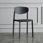 Plastic Contemporary Armless Chair Open Back Dining Kitchen Room Chair Black 1 Piece Clearhalo 'Dining Chairs' 'Dining Tables & Seating' 'dining_chair' 'Furniture' 'furniture_dining_chair' 'Kitchen & Dining Furniture' 5086586