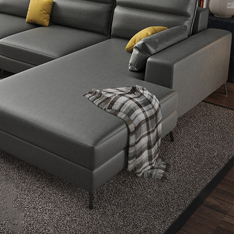 Fuce in pelle a forma di L sezionale con cuscino indietro per quattro persone