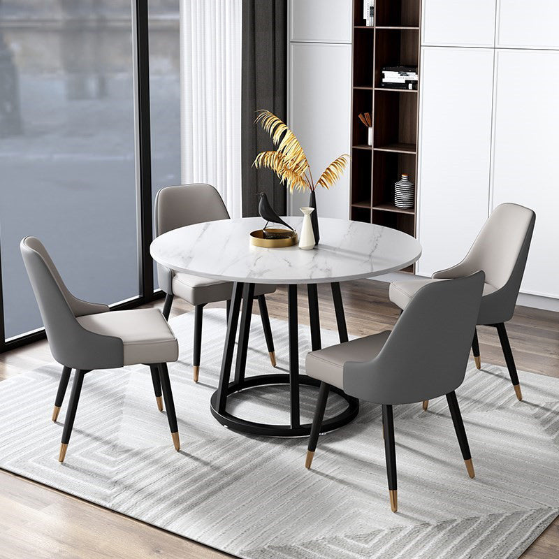 Mesa de comedor de base de hierro negro redondo Mesa de pedestal de piedra moderna