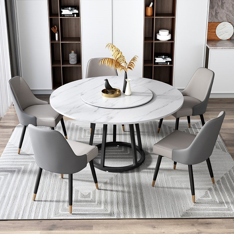 Mesa de comedor de base de hierro negro redondo Mesa de pedestal de piedra moderna