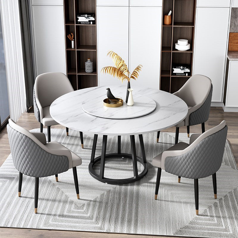 Mesa de comedor de base de hierro negro redondo Mesa de pedestal de piedra moderna