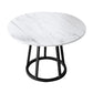 Mesa de comedor de base de hierro negro redondo Mesa de pedestal de piedra moderna