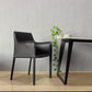 Silla lateral sólida contemporánea con brazos Silla de comedor de cuero sintético