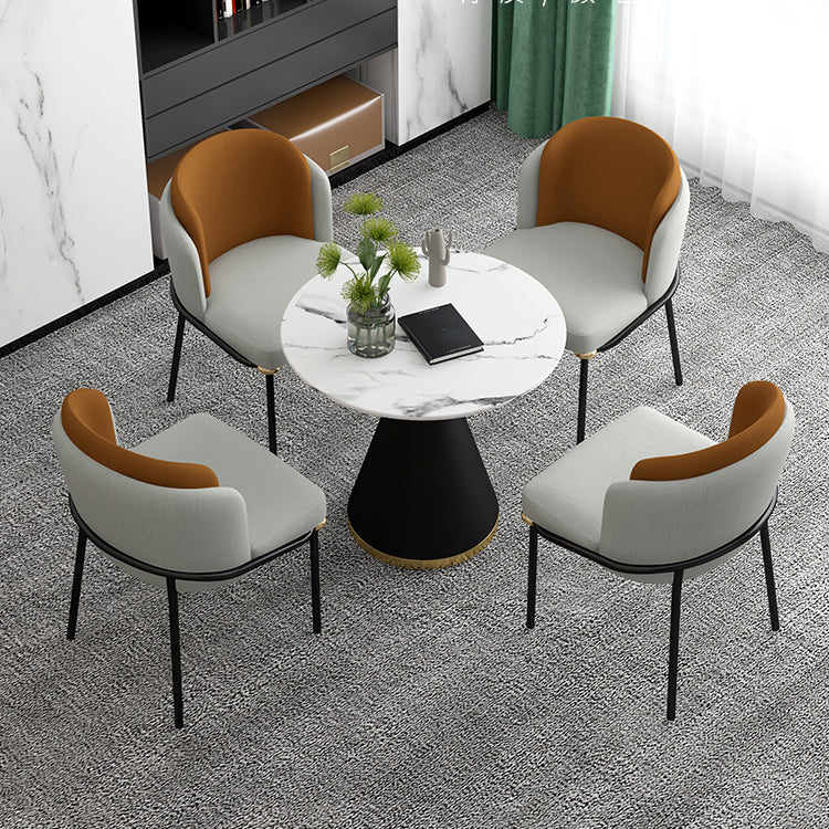 Tavolo da pranzo rotondo contemporaneo in metallo tavolo in pietra sinterizzata con base piedistallo