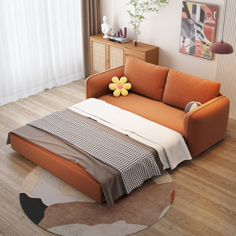 Divano letto convertibile contemporaneo di divano con cuscini in arancione