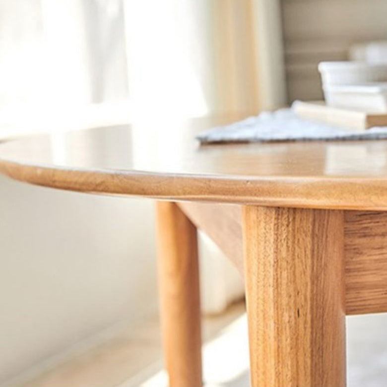 丸いダイニングテーブルモダン4脚木の色固定材のテーブル