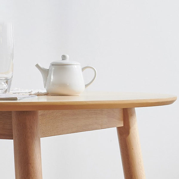 丸いダイニングテーブルモダン4脚木の色固定材のテーブル