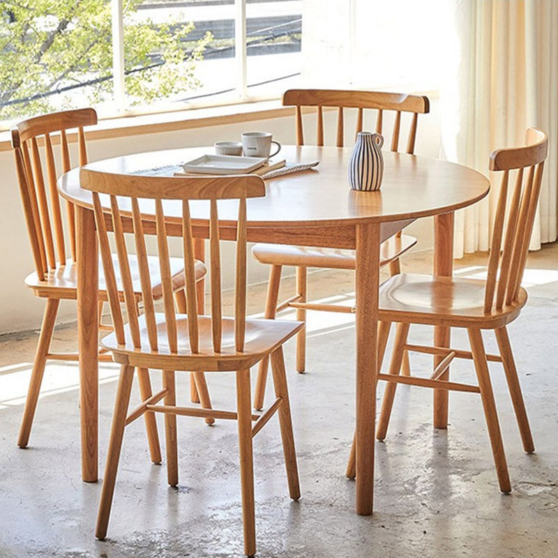 丸いダイニングテーブルモダン4脚木の色固定材のテーブル