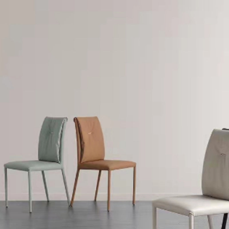 Eigentijdse faux lederen eetkamerstoelen metalen armloze eetkamerstoel voor thuisgebruik