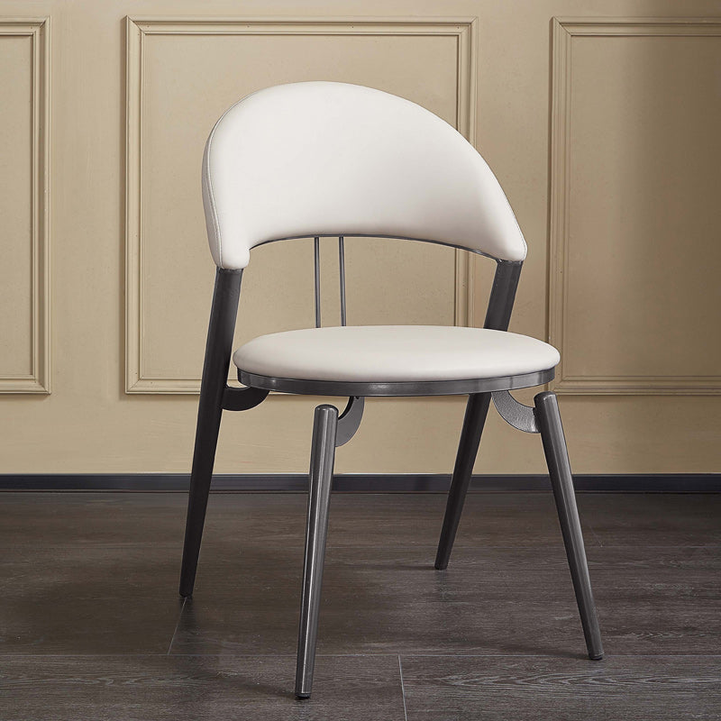 Minimalistische stijl armloze open achterkant stoelen faux lederen eetkamerstoelen