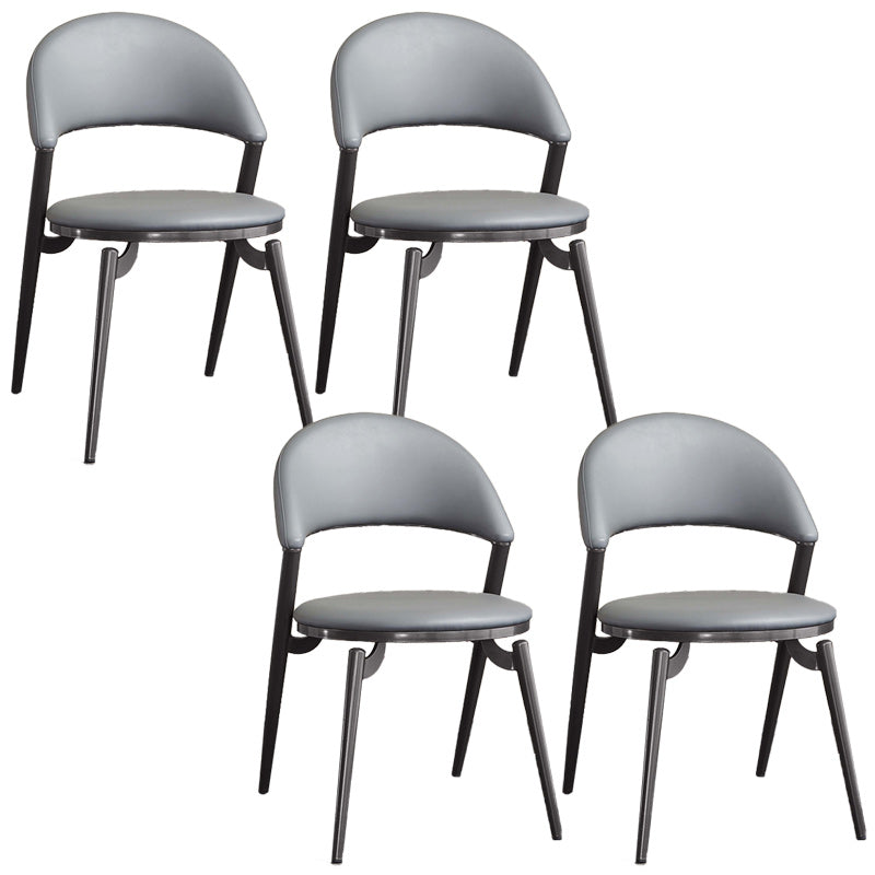 Minimalistische stijl armloze open achterkant stoelen faux lederen eetkamerstoelen