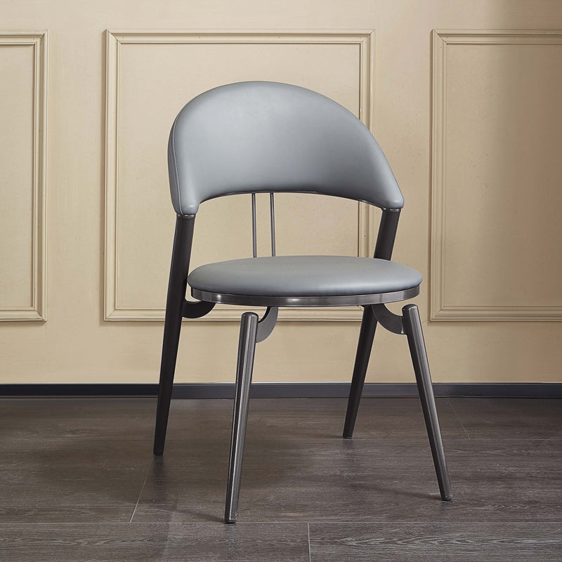 Minimalistische stijl armloze open achterkant stoelen faux lederen eetkamerstoelen