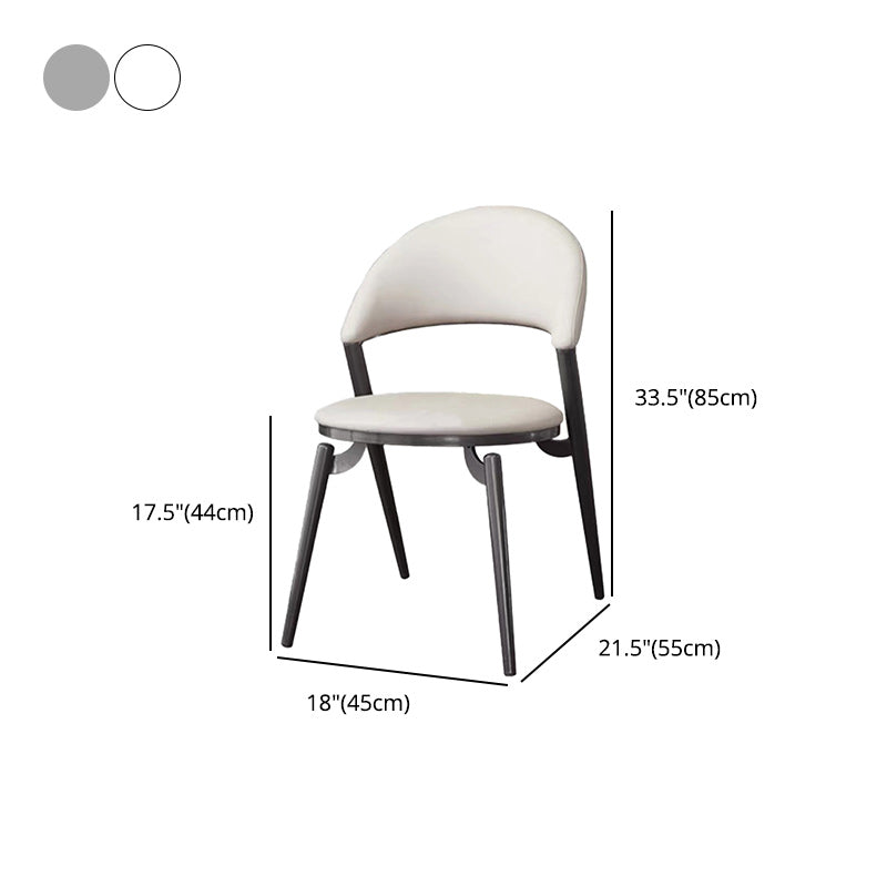 Minimalistische stijl armloze open achterkant stoelen faux lederen eetkamerstoelen