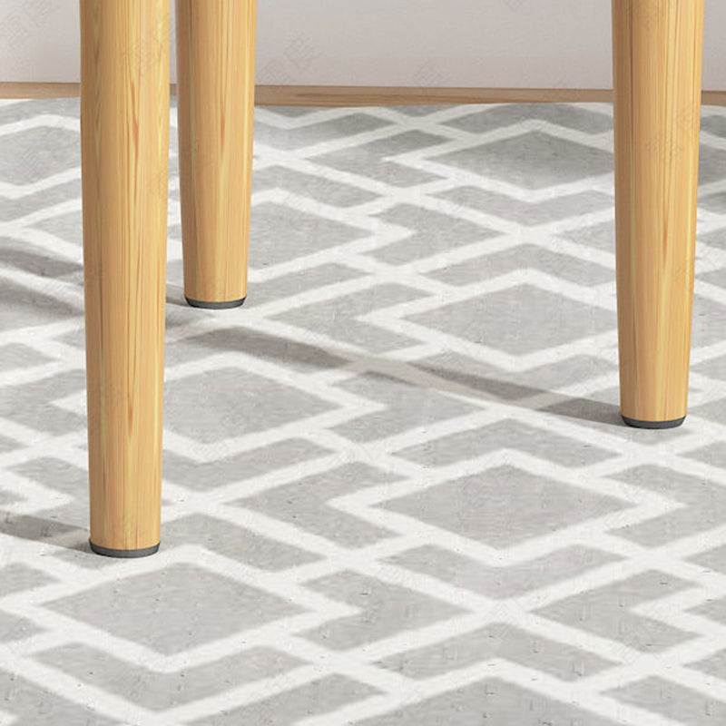 Eigentijdse, gestoffeerde zijstoel met matte afwerking, eetkamerstoel met open rug