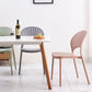 Silla lateral de té de leche escandinava apilada acabado mate silla de comedor de plástico