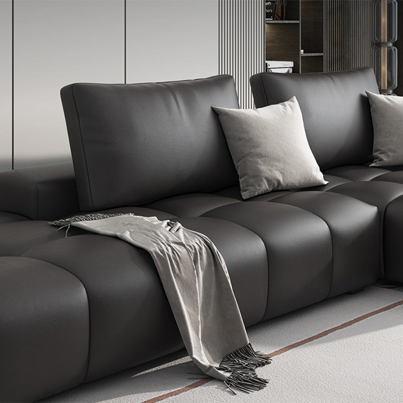 Un côté accoudoir du côté canapé arrière-lit en cuir d'imitation noire canapé en cuir