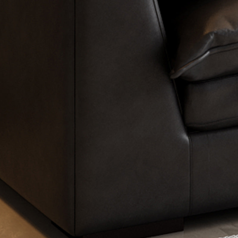 Soggiorno in vetro in pelle stazionaria in vetrino. Divano nero