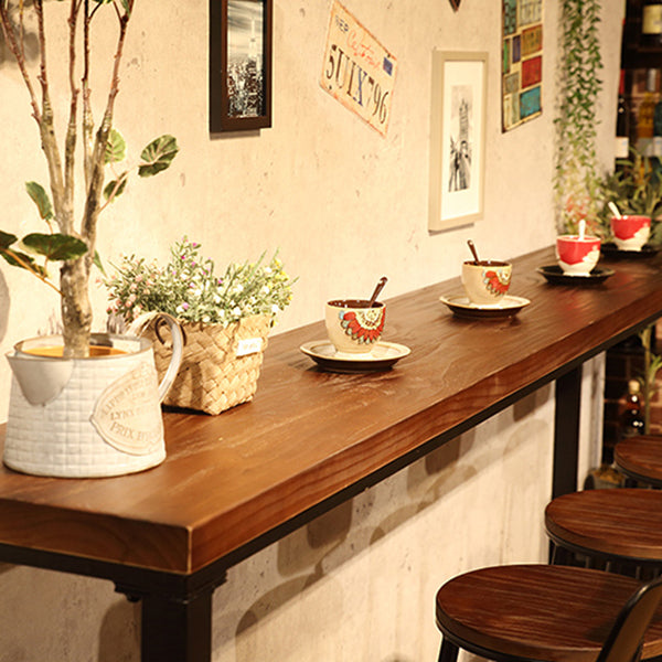 Mesa de comedor de acento de bistro de madera maciza industrial