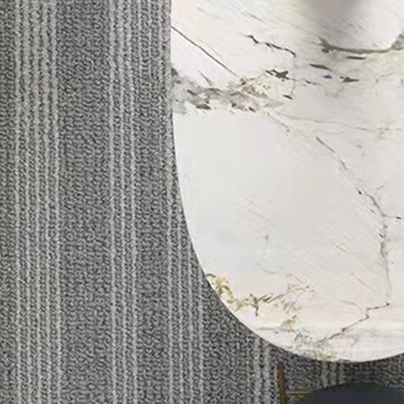 Mesa de comedor de piedra sinterizada de lujo con 3 patas en oro