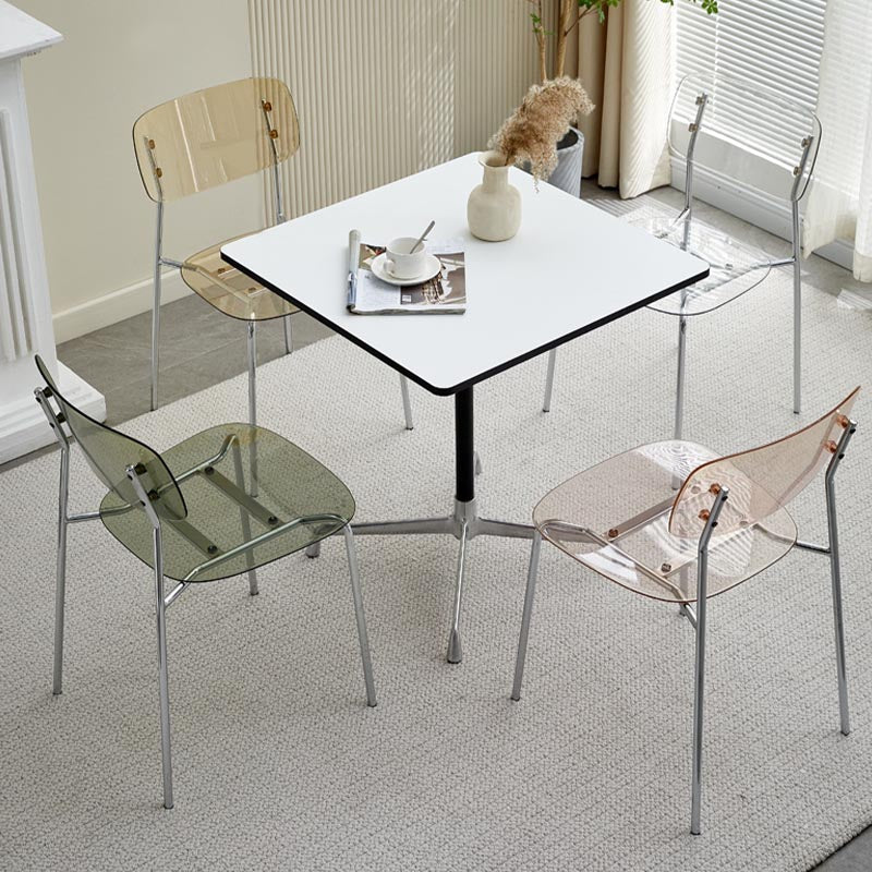 Poltrona da pranzo acrilica contemporanea sedia da pranzo aperta con zampe d'argento