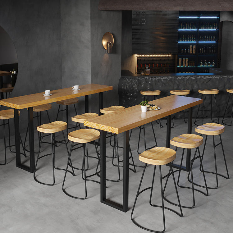 Tavolo da pranzo a barre di legno rettangolare tavolo da bar contemporaneo con base in slitta in nero