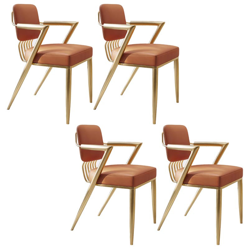 グラム布張りのダイニングアームチェアレザーレザーダイニングチェアと金色の脚