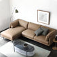 Seccionales de color marrón claro/sofá con almohada y brazo superior de almohada