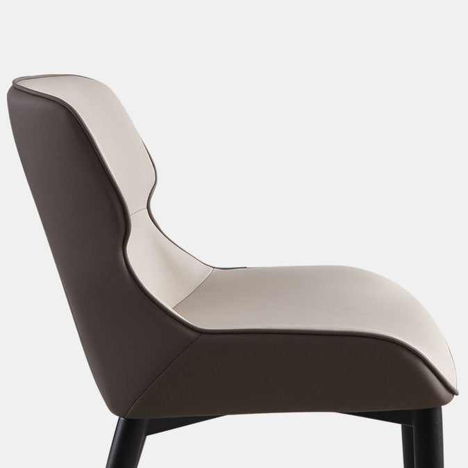 Sedia da pranzo in pelle contemporanea sedia laterale di wingback con gambe in acciaio in finitura opaca