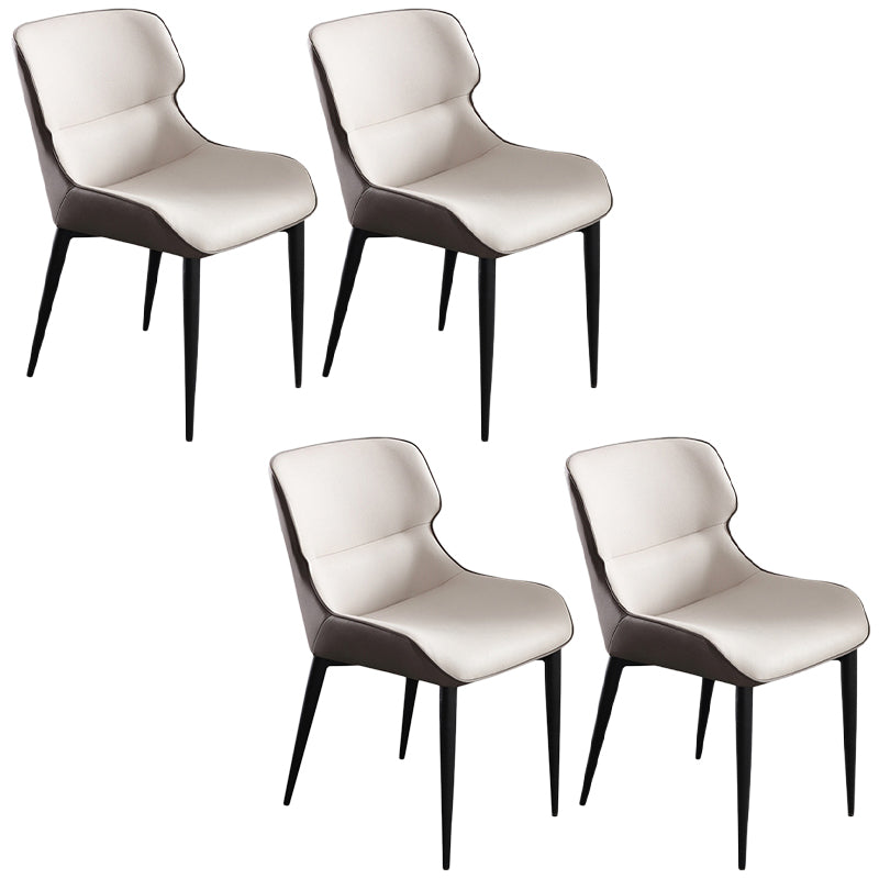 Sedia da pranzo in pelle contemporanea sedia laterale di wingback con gambe in acciaio in finitura opaca