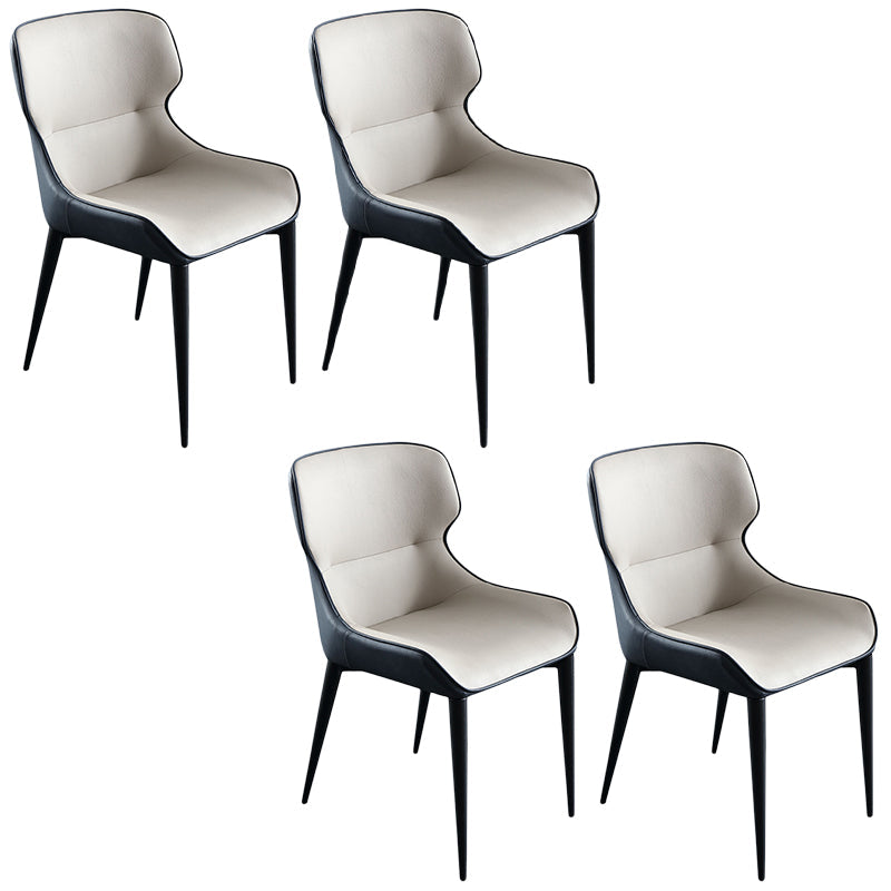 Sedia da pranzo in pelle contemporanea sedia laterale di wingback con gambe in acciaio in finitura opaca