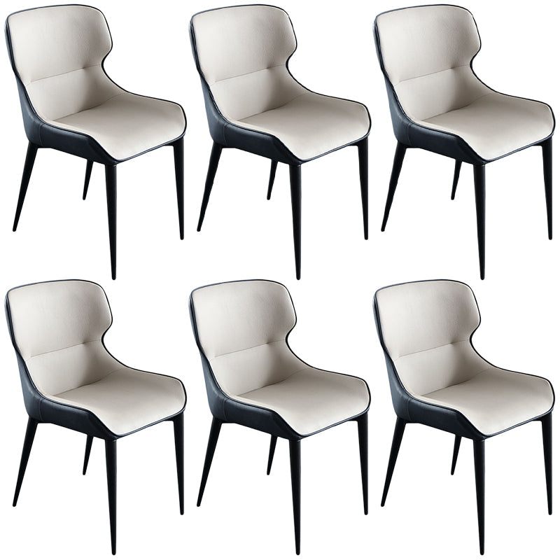 Sedia da pranzo in pelle contemporanea sedia laterale di wingback con gambe in acciaio in finitura opaca
