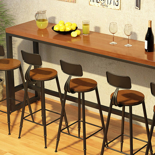 Tavolo da pranzo a barre di legno rettangolo tavolo da bar contemporaneo con base di cavalletto in nero