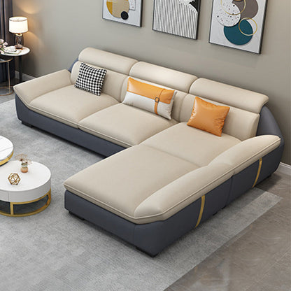 Nordic Faux Leather Sectional in Beige Flared Arm Sectional with Pillows 105.5"L x 69"W x 35"H Reversible