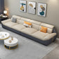 Nordic Faux Leather Sectional in Beige Flared Arm Sectional with Pillows