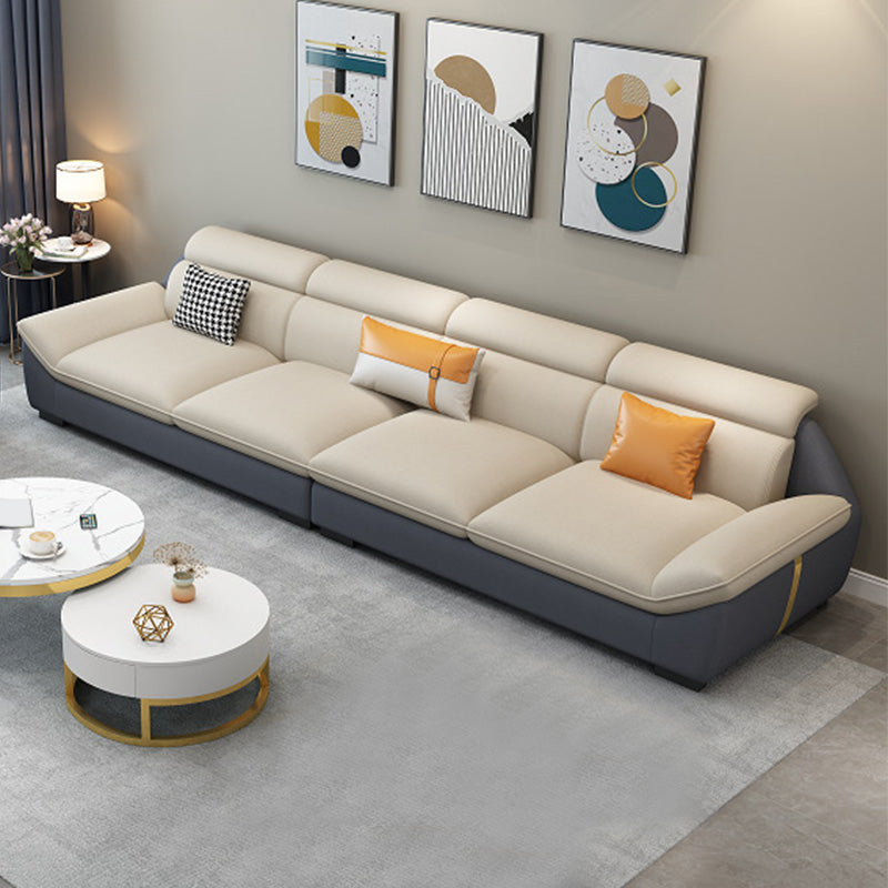 Nordic Faux Leather Sectional in Beige Flared Arm Sectional with Pillows