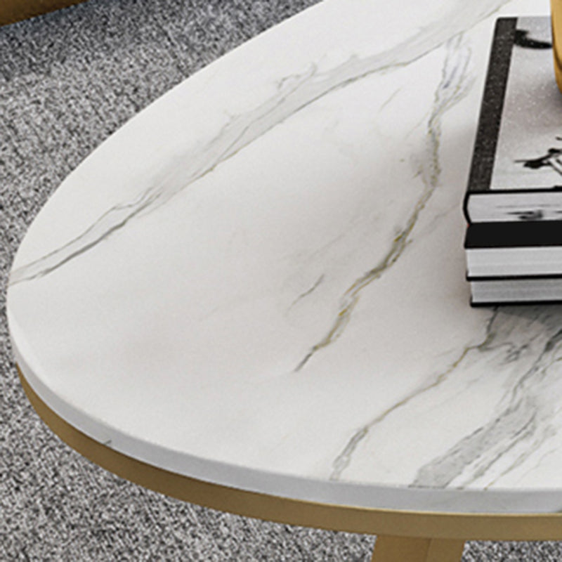 脚のコーヒーテーブルラウンド/楕円形のカクテルテーブルは金/黒い脚