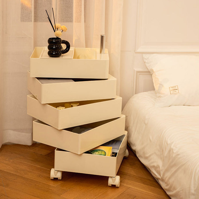 Mesa de noche de plástico de 28 "de altura con cajones y ruedas