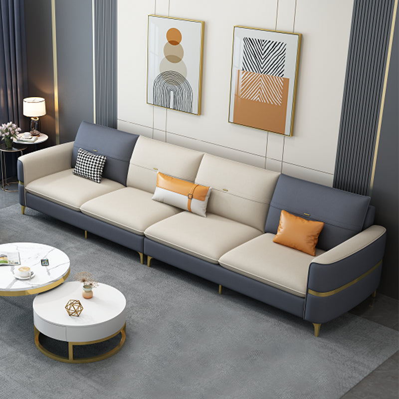 Sofá de brazo cuadrado de cuero de forma escandinava con 2 almohadas