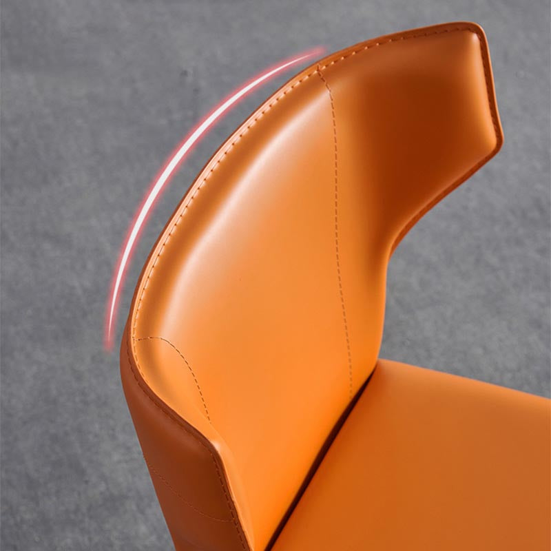 Silla lateral de ala de silla de comedor de cuero contemporánea en acabado mate con patas de acero