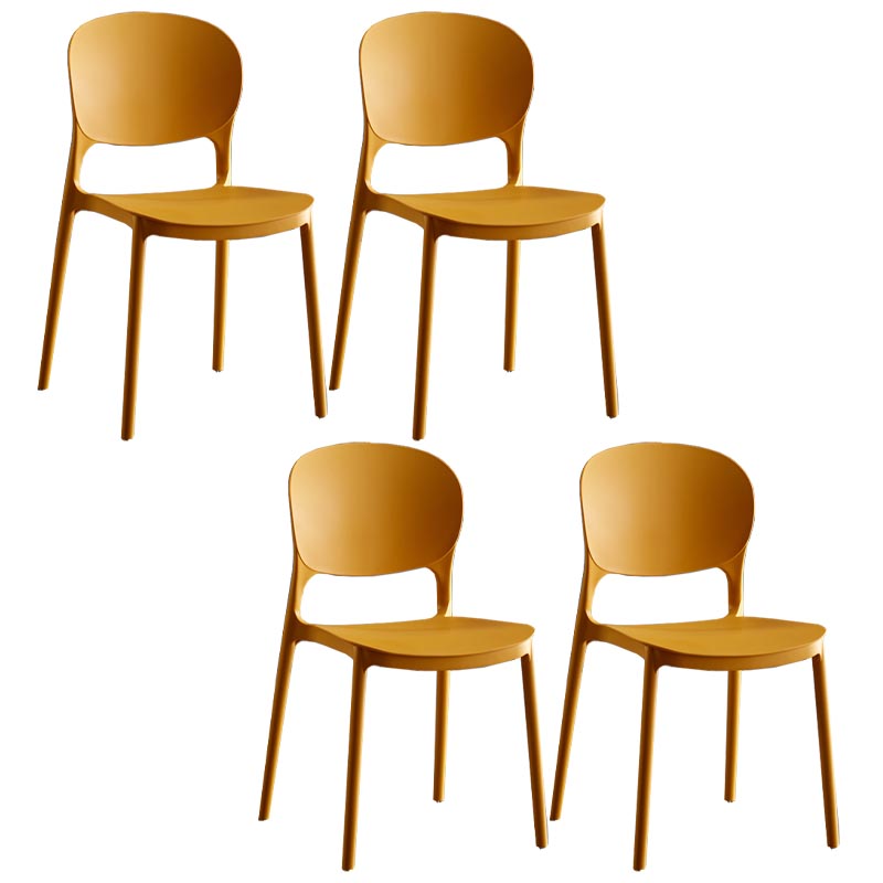 Glam Plastic Side Chair Stacking Open Back Dining Side Chair Orange Yellow 4 Piece Set Clearhalo 'Dining Chairs' 'Dining Tables & Seating' 'dining_chair' 'furn' 'furn_dining_chair' 'Furniture' 'Kitchen & Dining Furniture' 5447171