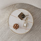 Mesa de centro con tapa de piedra Glam y mesa de cóctel redonda con base de tambor de acero