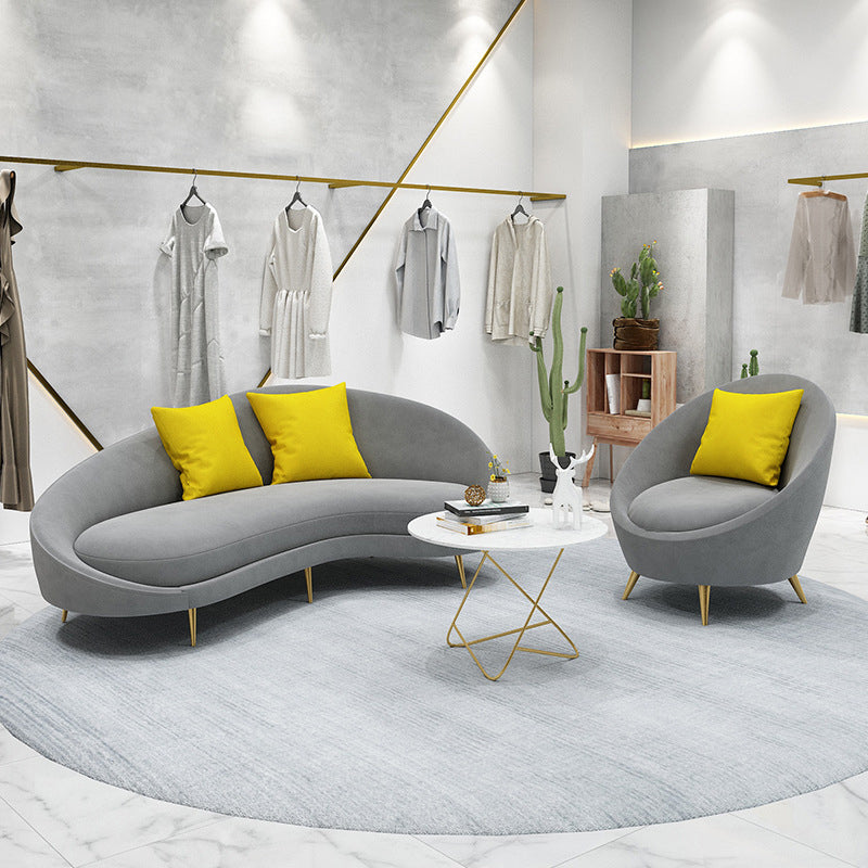 タイトな背中とアパート用のタキシードアームを備えた超近代的な湾曲したソファー