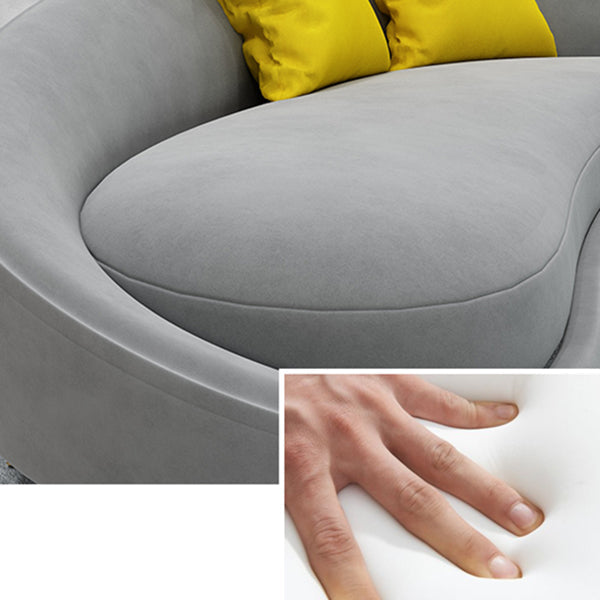 タイトな背中とアパート用のタキシードアームを備えた超近代的な湾曲したソファー