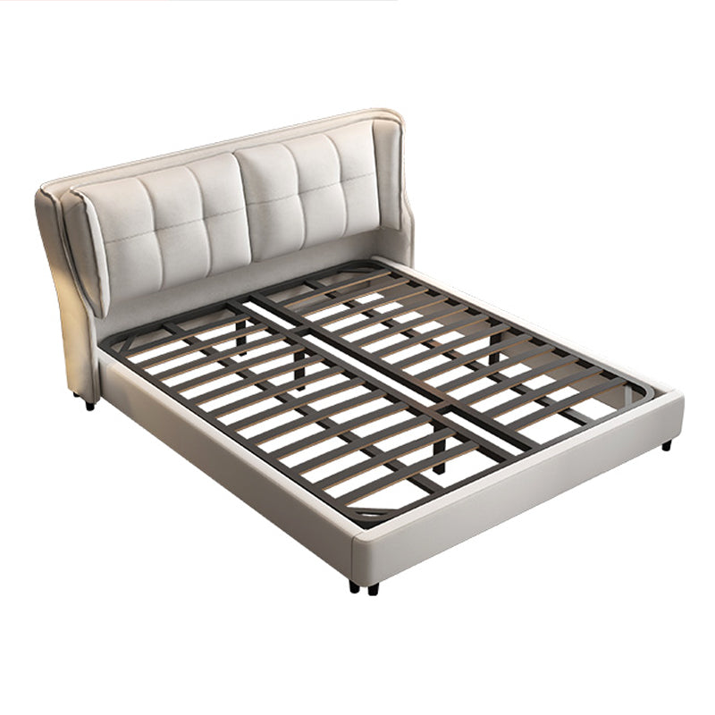 Zeitgenössisches, getuftetes Standardbett mit Wingback -Kopfteil und Beinen