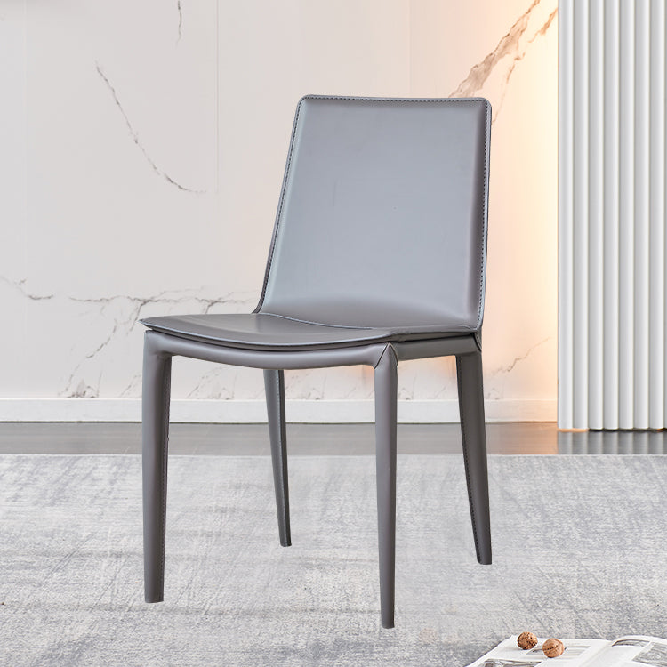 Silla de metal sin brazo de comedor de cuero de estilo moderno para uso en el hogar