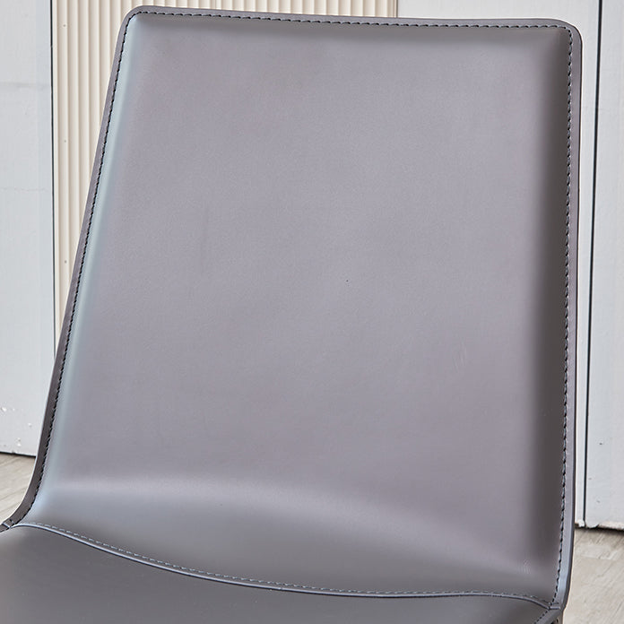 Silla de metal sin brazo de comedor de cuero de estilo moderno para uso en el hogar