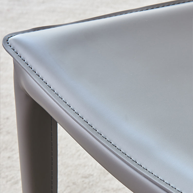 Silla de metal sin brazo de comedor de cuero de estilo moderno para uso en el hogar