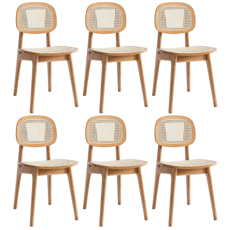 Sillas de comedor de ratán modernas muebles de comedor abiertos con patas de madera en acabado mate